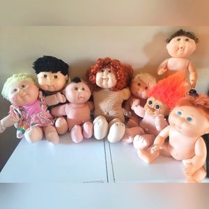 8 Cabbage Patch Dolls